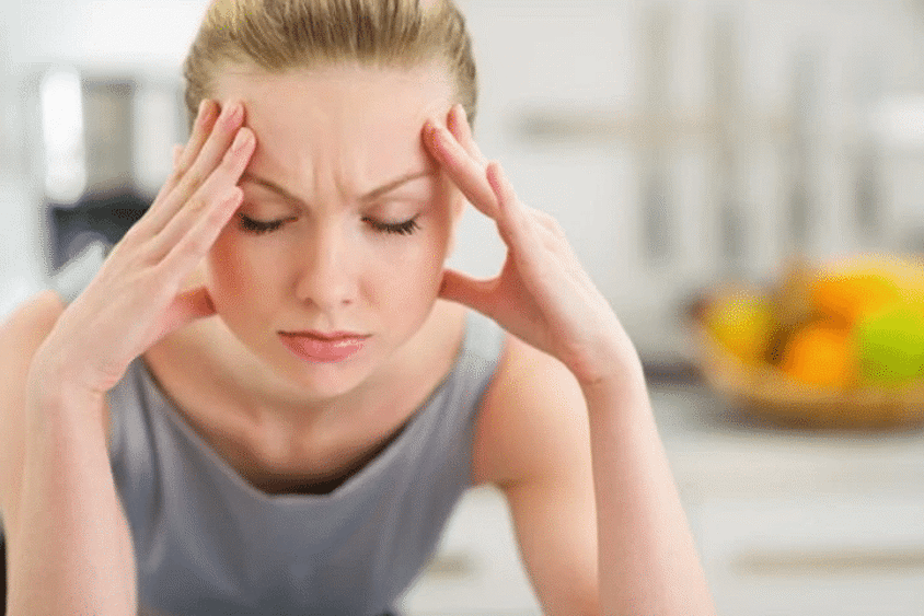 woman suffering from ocular migraine