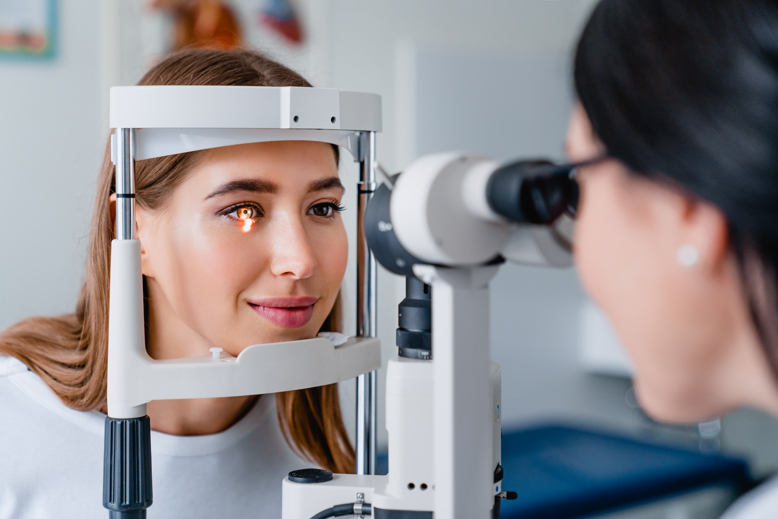 Optometrist carrying out a slit lamp examination
