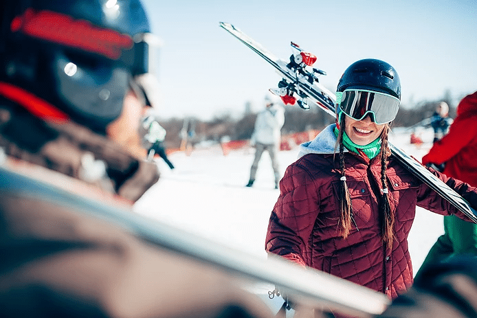 Skiers With Googles To Prevent Snow Blindness