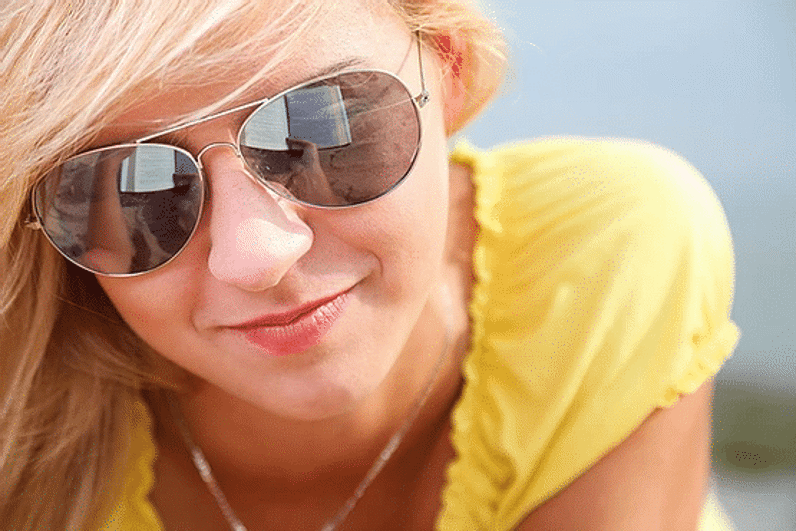 woman wearing sunglasses with uv protection