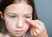 Little Child Girl Putting Contact Lens Into Her Ey 2023 03 30 20 55 52 Utc