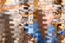 Two Women Fitting Spectacles Frames 293X300