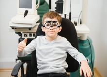 Small Serious Boy Sitting On Chair Office Of Visio 2023 10 18 05 29 52 Utc