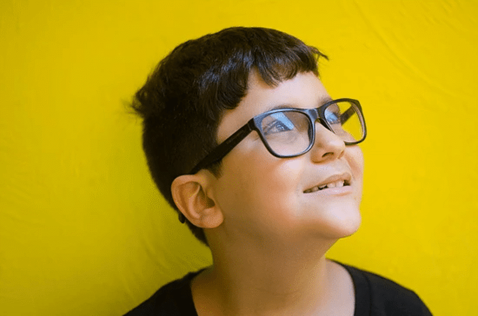 child wearing their new glasses